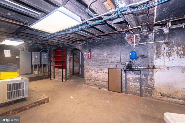 a view of entryway with stairs and wooden floor