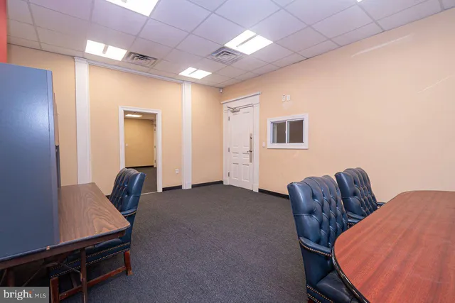 a view of a room with furniture and toys