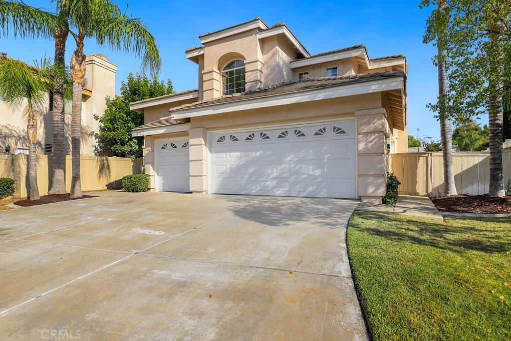 45052 Corte Rosa Temecula, CA 92592 - Photo 1 of 1 a front view of a house with a yard
