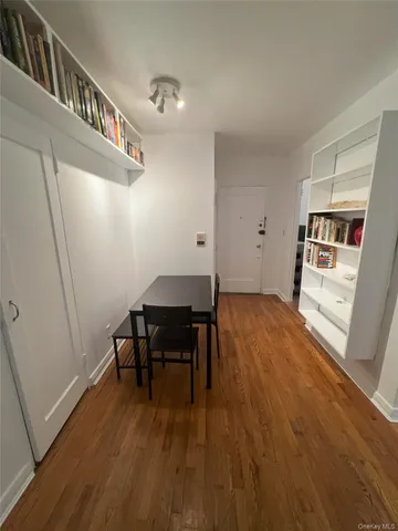 a view of a livingroom with furniture and wooden floor