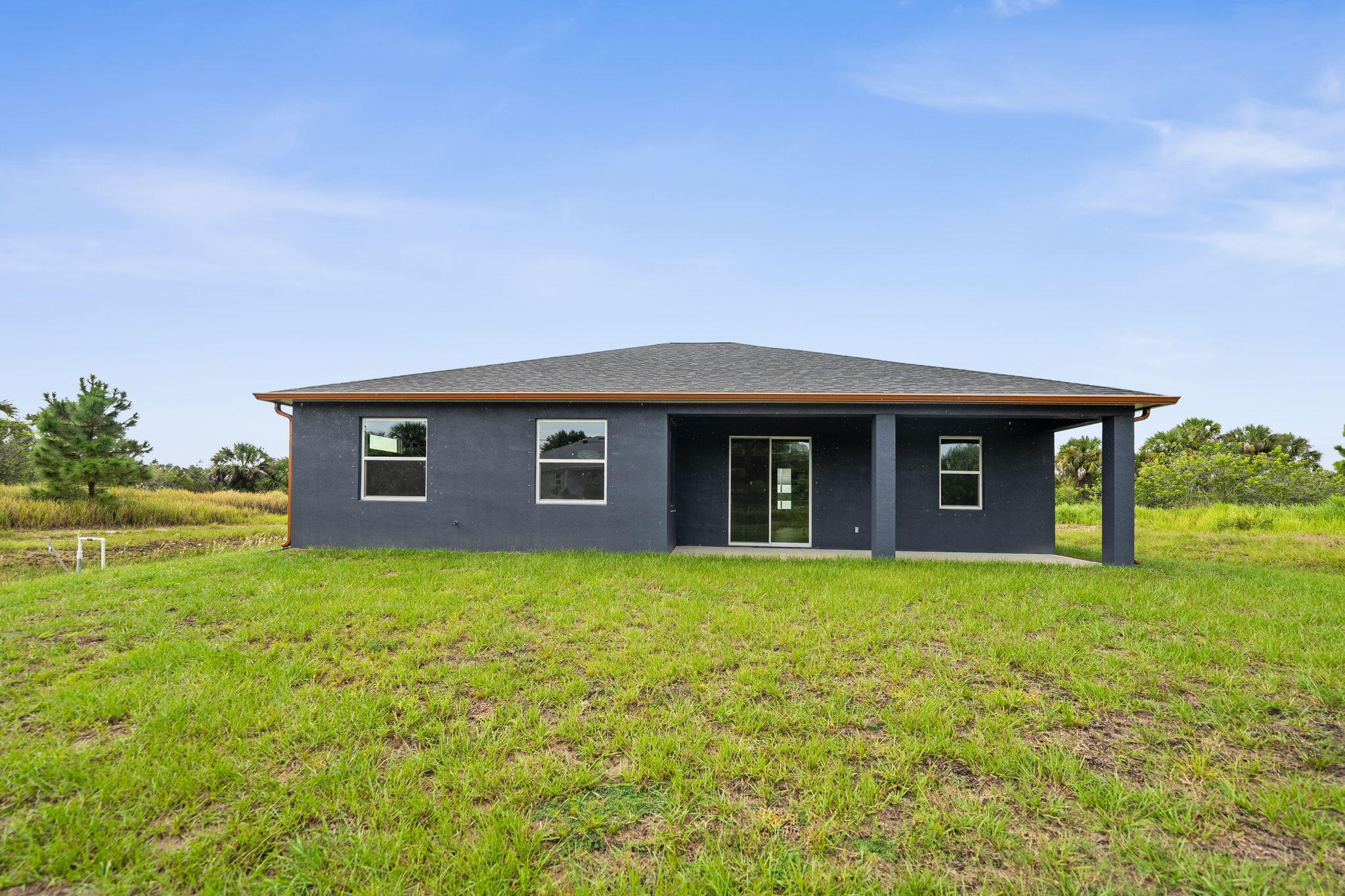 3113 Nighthawk Avenue Palm Bay, FL 32908 - Photo 30 of 33 a house view with a outdoor space