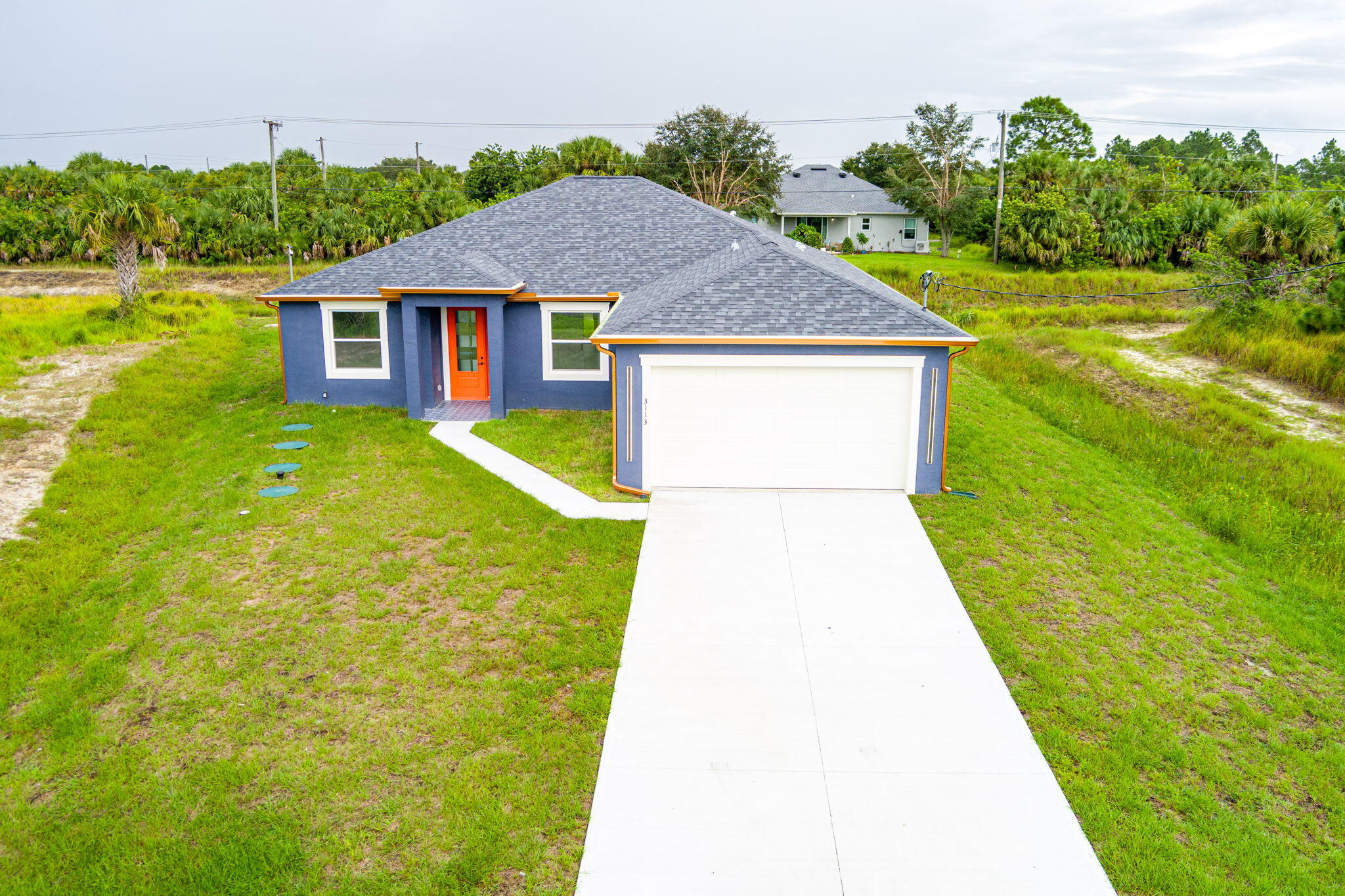 3113 Nighthawk Avenue Palm Bay, FL 32908 - Photo 31 of 33 a view of house with garden