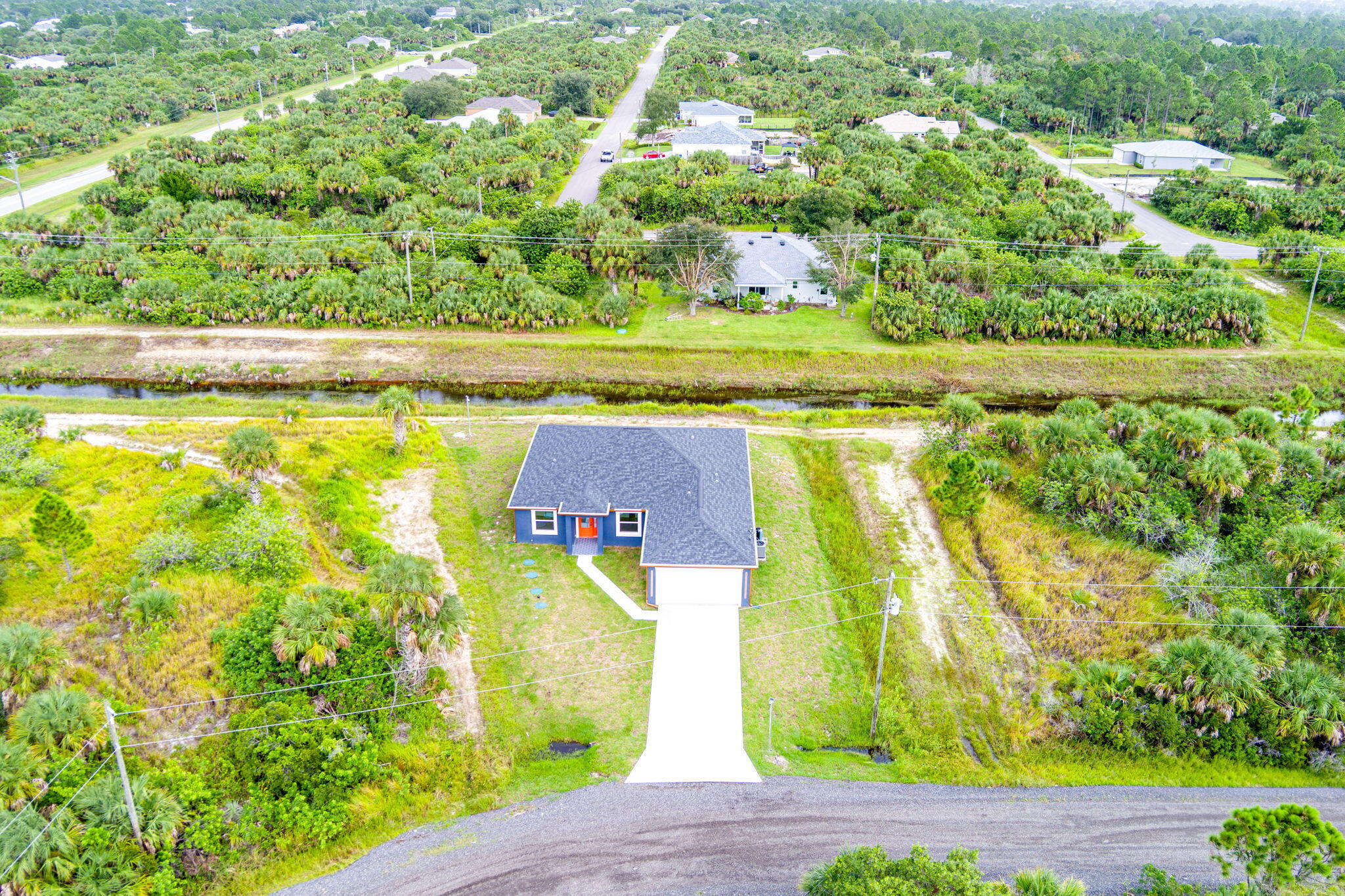 3113 Nighthawk Avenue Palm Bay, FL 32908 - Photo 32 of 33 a view of a swimming pool with a yard