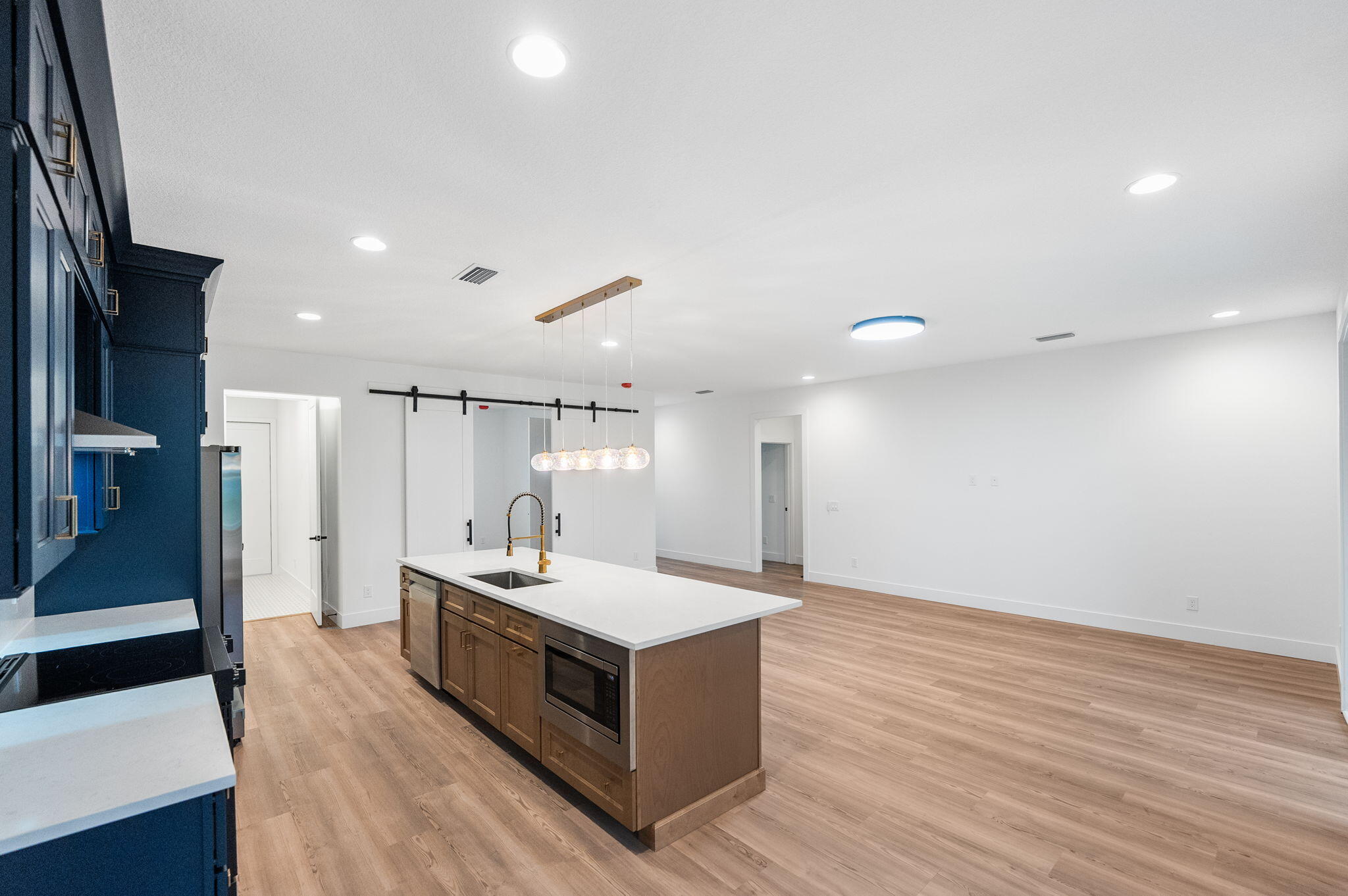 3113 Nighthawk Avenue Palm Bay, FL 32908 - Photo 8 of 33 a large room with a lot of counter space