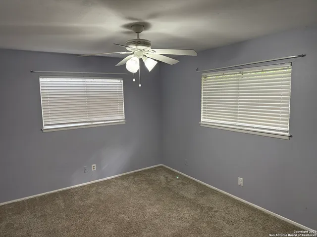 a view of an empty room with window