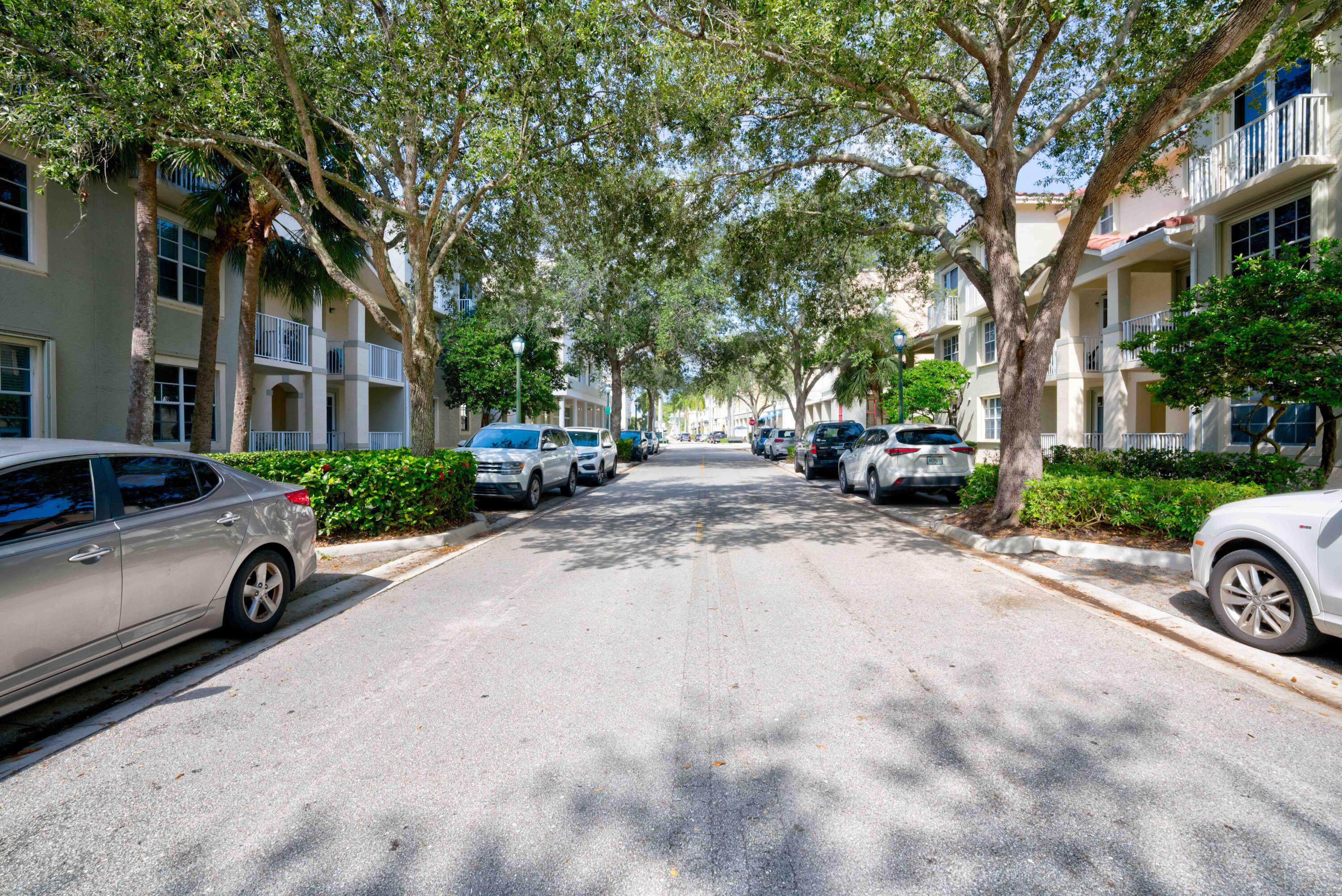 1136 Town Center Drive, Unit 11 Jupiter, FL 33458 - Photo 24 of 24 a view of a car parked in front of a brick house