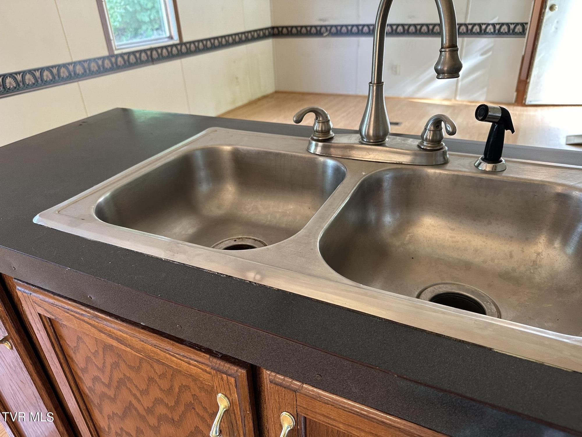 1370 Lovelace Road Fall Branch, TN 37656 - Photo 24 of 55 sink at bar area