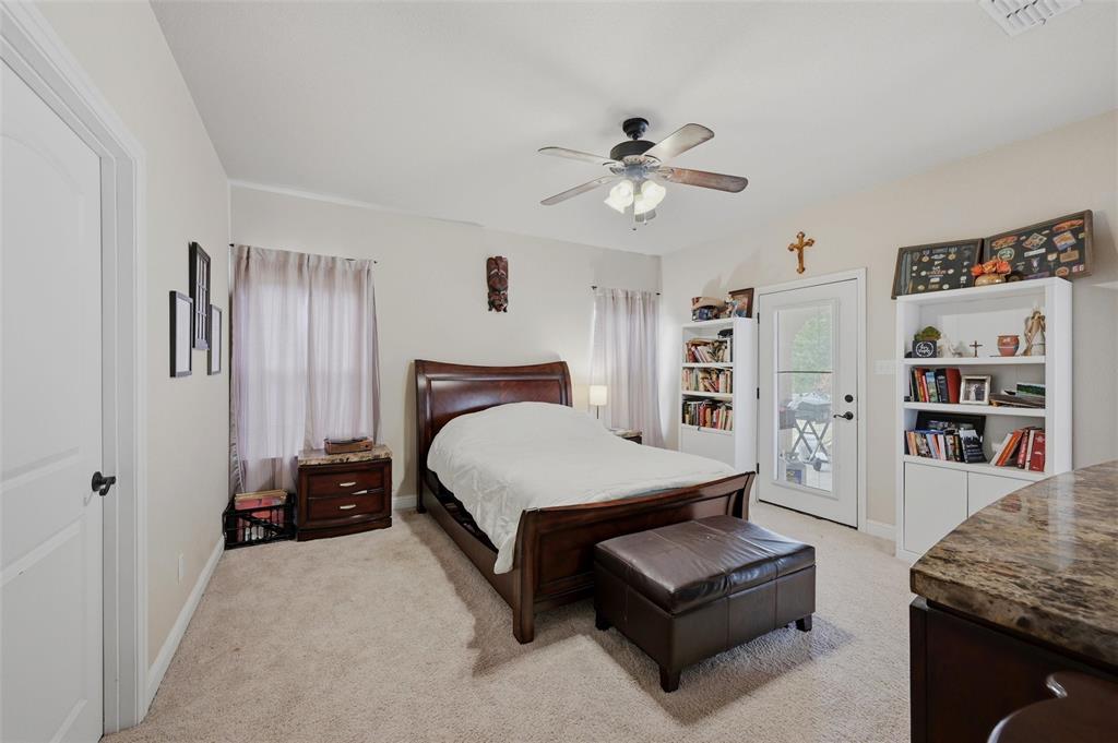 1959 Marlow Road Bells, TX 75414 - Photo 19 of 32 a bedroom with a bed furniture and decor