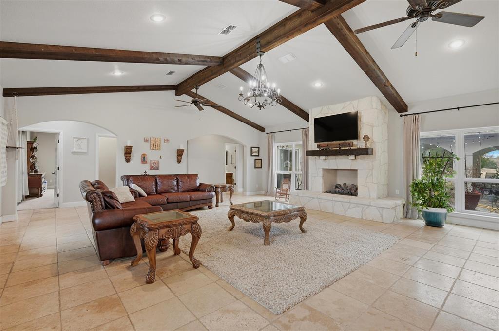 1959 Marlow Road Bells, TX 75414 - Photo 5 of 32 a living room with furniture and a flat screen tv