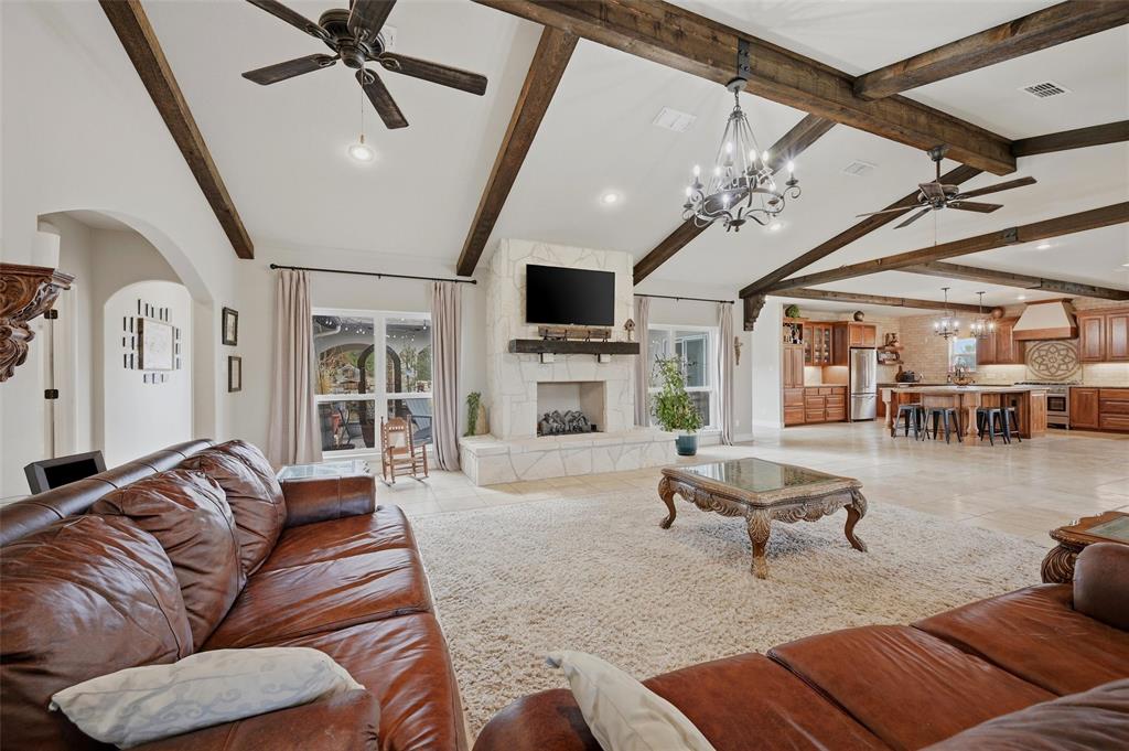 1959 Marlow Road Bells, TX 75414 - Photo 6 of 32 a living room with furniture and a flat screen tv