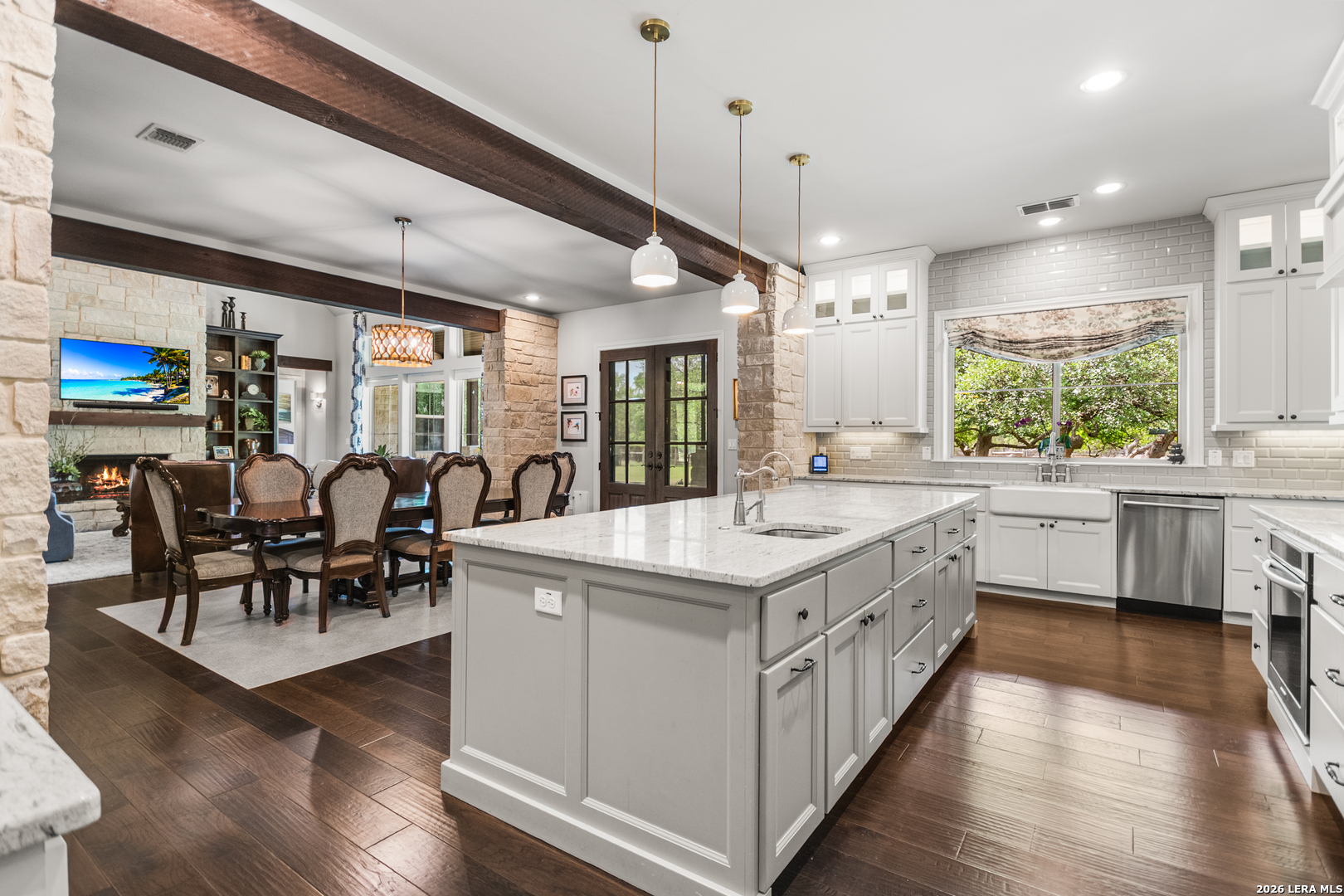 55 Brook Ridge Boerne, TX 78015 - Photo 11 of 59 a large white kitchen with lots of counter space a sink appliances and dining table