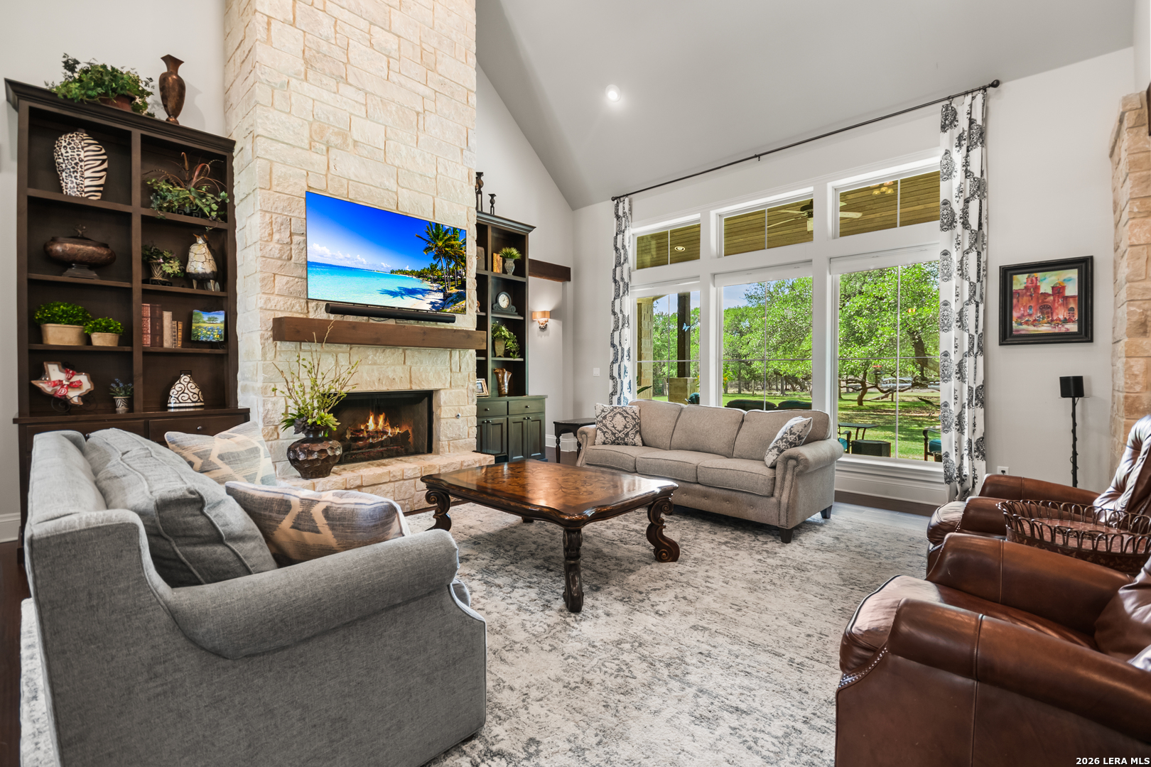 55 Brook Ridge Boerne, TX 78015 - Photo 17 of 59 a living room with furniture a flat screen tv and a fireplace