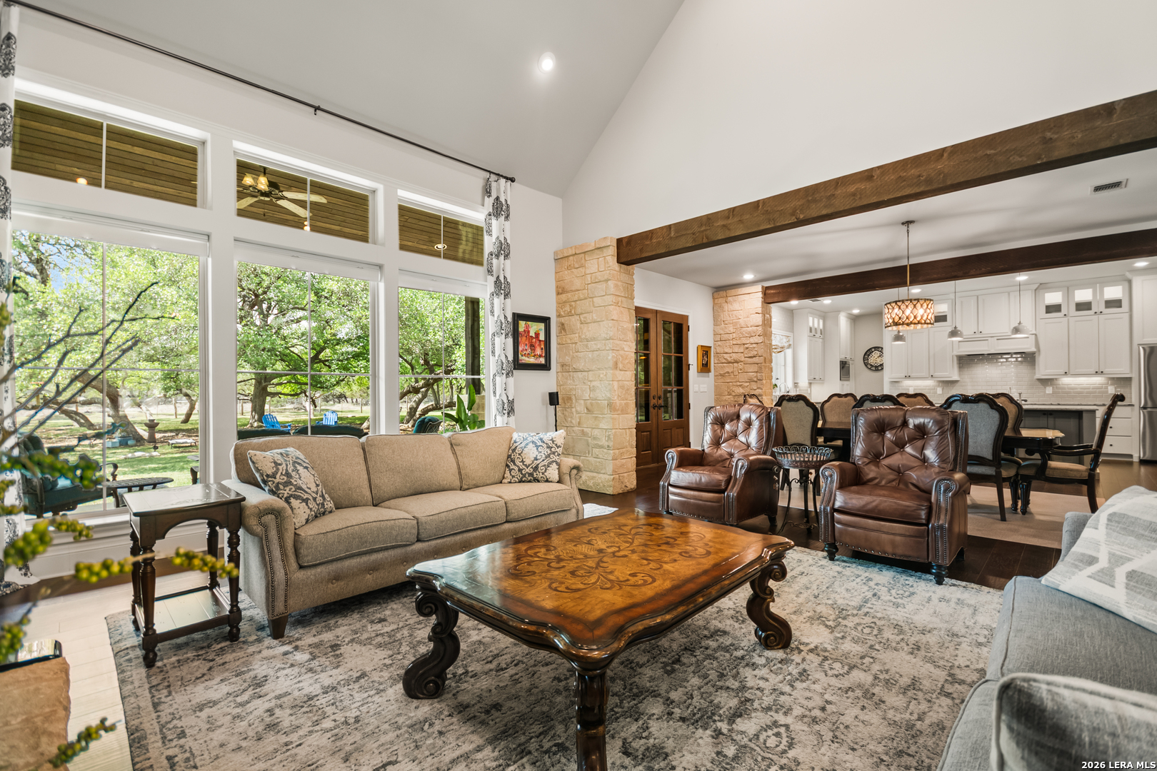 55 Brook Ridge Boerne, TX 78015 - Photo 18 of 59 a living room with furniture potted plant and a large window