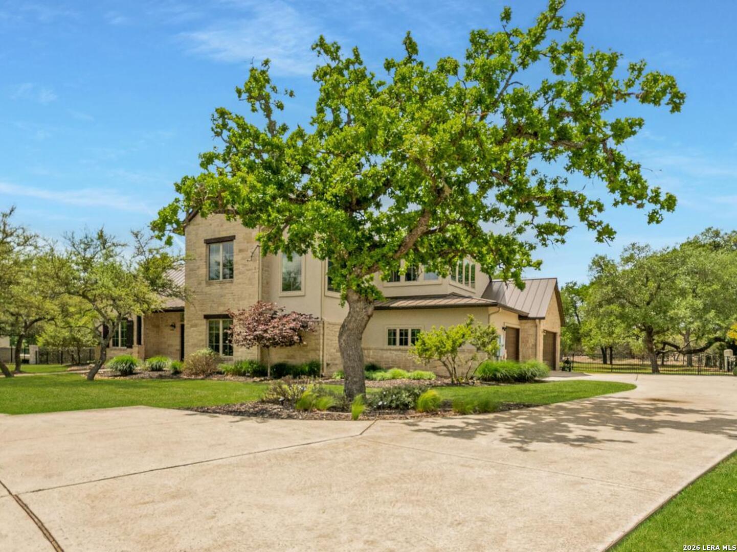 55 Brook Ridge Boerne, TX 78015 - Photo 2 of 59 front view of a house with a yard