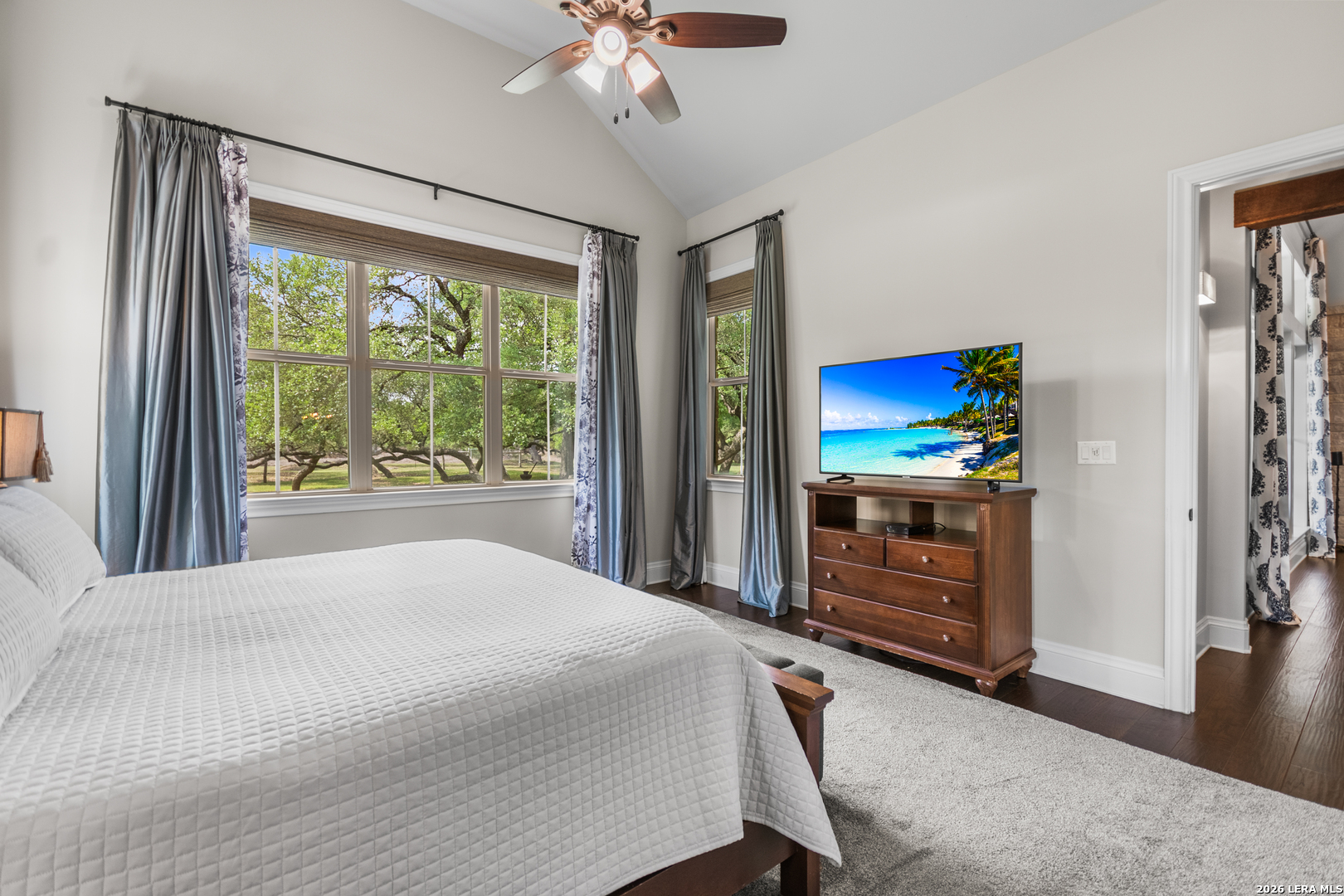 55 Brook Ridge Boerne, TX 78015 - Photo 27 of 59 a bedroom with a bed and a flat screen tv