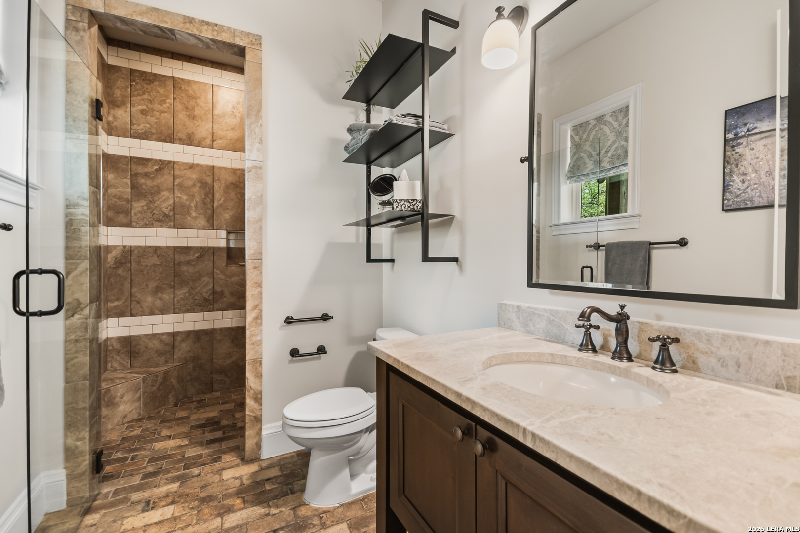 55 Brook Ridge Boerne, TX 78015 - Photo 34 of 59 a bathroom with a granite countertop sink toilet and shower