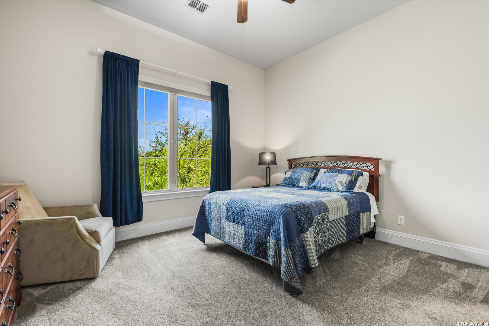 55 Brook Ridge Boerne, TX 78015 - Photo 37 of 59 a spacious bedroom with a bed and a window