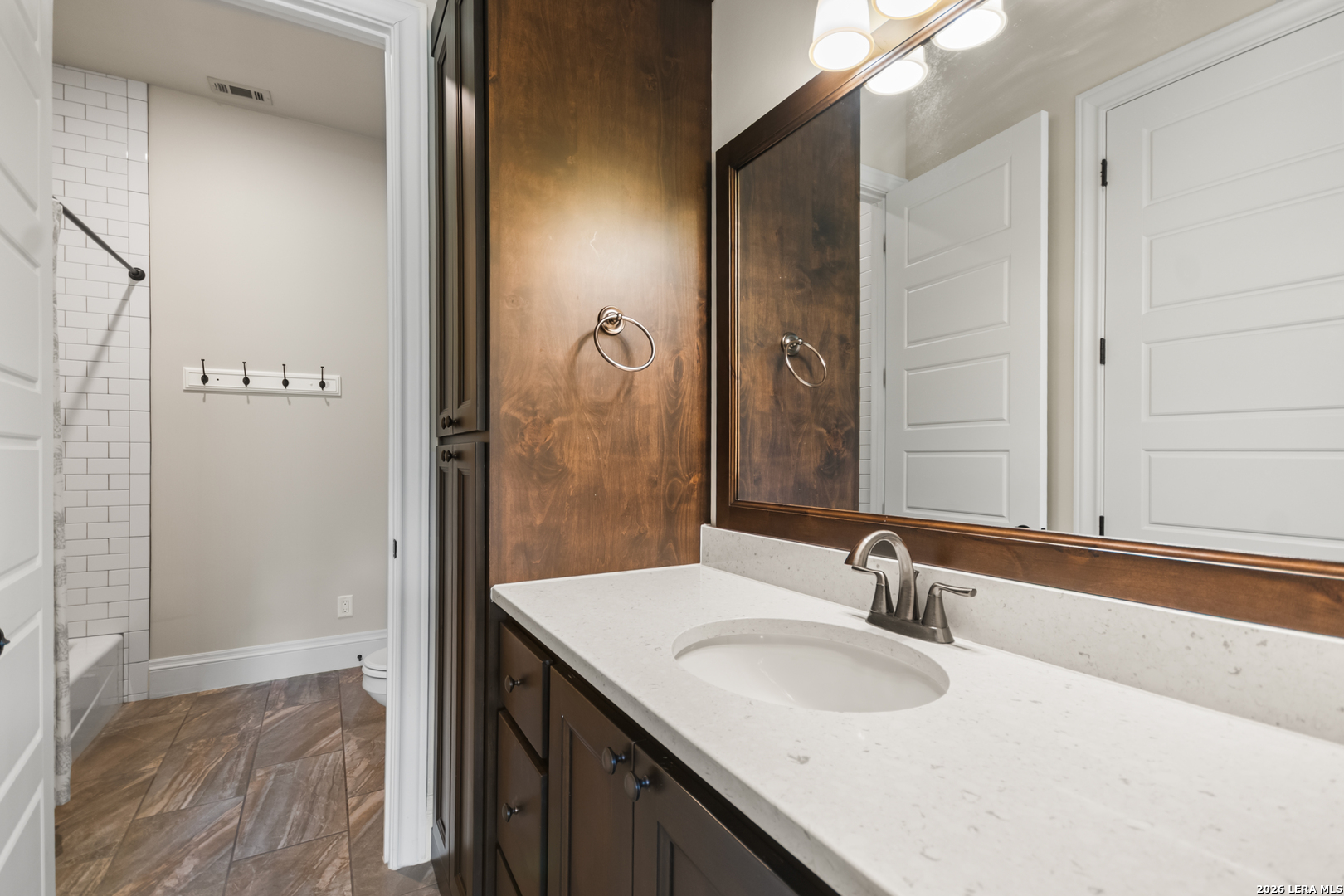 55 Brook Ridge Boerne, TX 78015 - Photo 38 of 59 a bathroom with a sink and a mirror