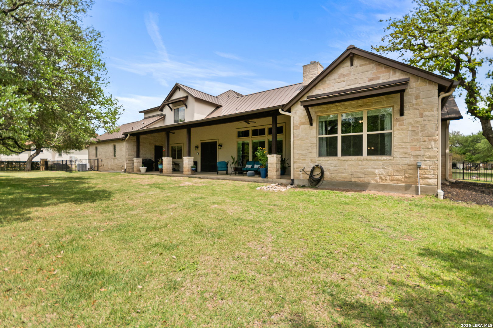 55 Brook Ridge Boerne, TX 78015 - Photo 48 of 59 a front view of a house with a yard