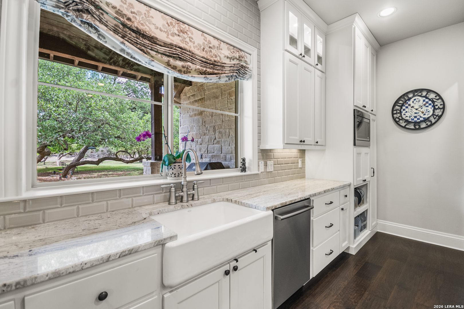 55 Brook Ridge Boerne, TX 78015 - Photo 7 of 59 a bathroom with a granite countertop sink mirror and a window