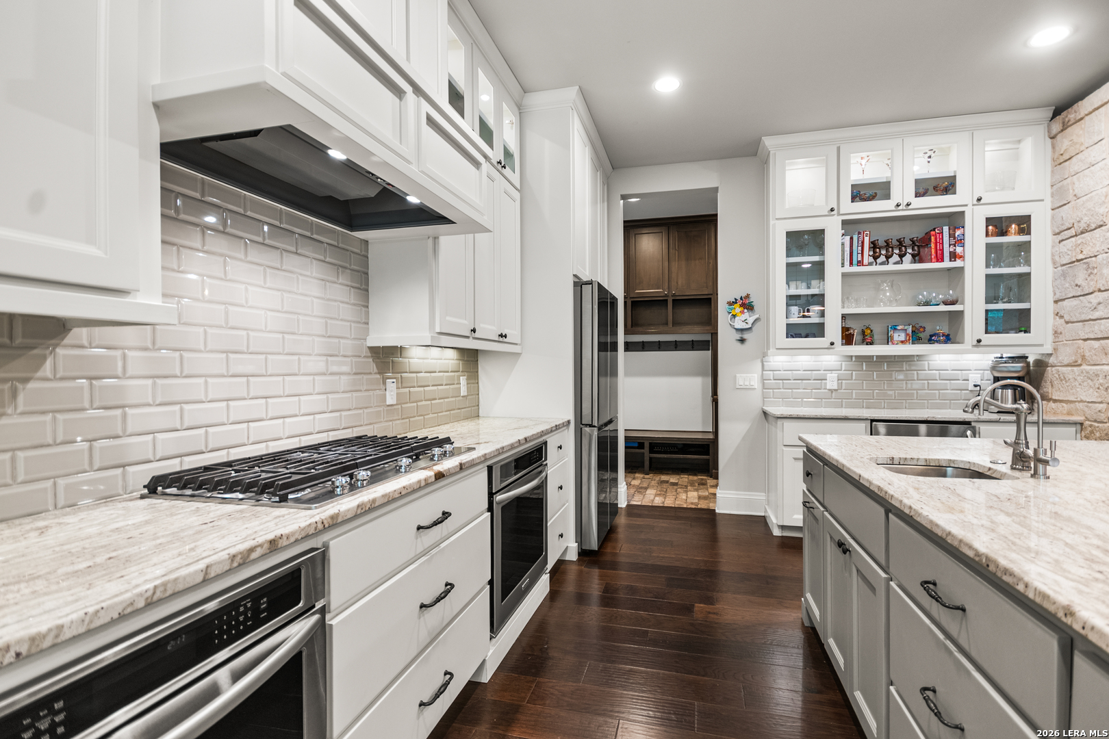 55 Brook Ridge Boerne, TX 78015 - Photo 10 of 59 a kitchen with stainless steel appliances granite countertop a stove and a refrigerator