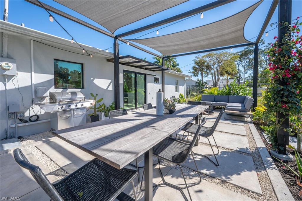 4608 Normandy Drive Naples, FL 34112 - Photo 34 of 49 a view of a patio with furniture