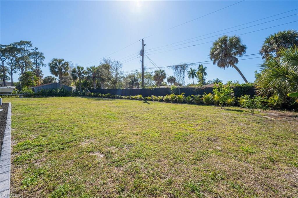 4608 Normandy Drive Naples, FL 34112 - Photo 37 of 49 a view of a swimming pool and outdoor space