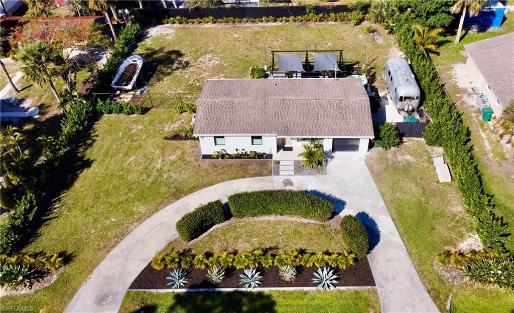 4608 Normandy Drive Naples, FL 34112 - Photo 47 of 49 an aerial view of a house with a swimming pool