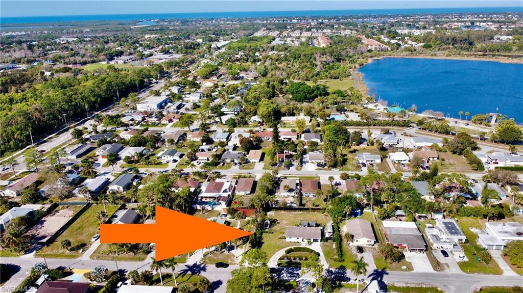 4608 Normandy Drive Naples, FL 34112 - Photo 49 of 49 an aerial view of residential houses with outdoor space