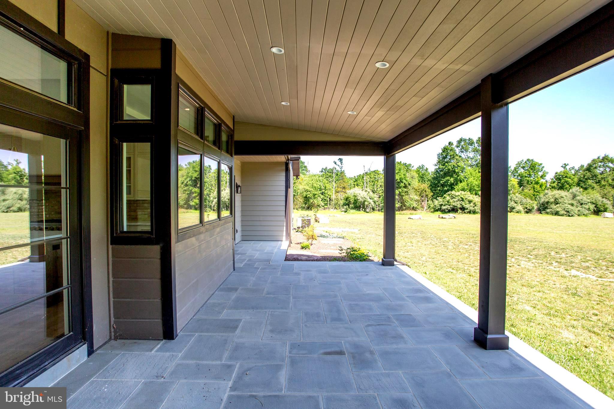 5823 Rodgers Road Pipersville, PA 18947 - Photo 23 of 46 Bluestone Covered Patio