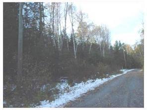 Lot 3 Hartland Road Rangeley, ME 04970 - Photo 14 of 20 Lot is on the left, sloping with a...