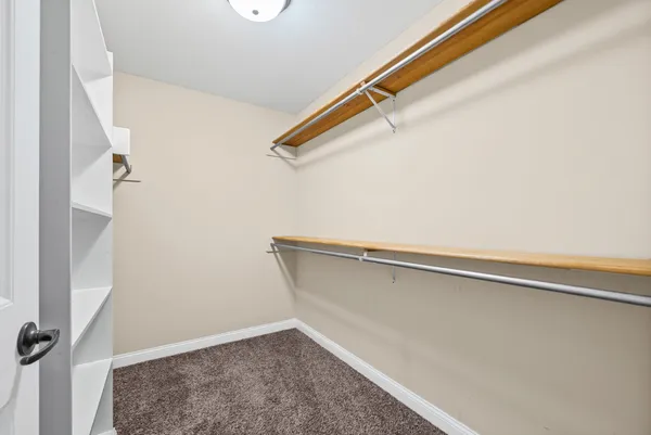 a view of a room with racks on the wall