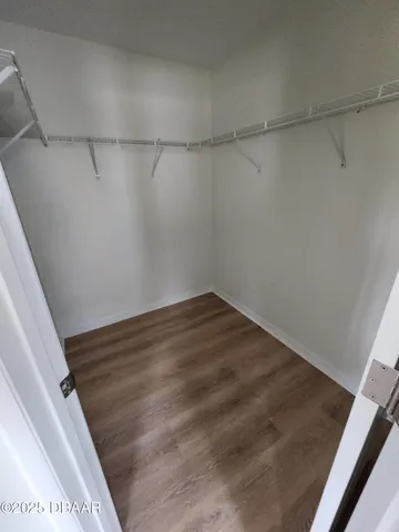 a view of a room with racks on the wall