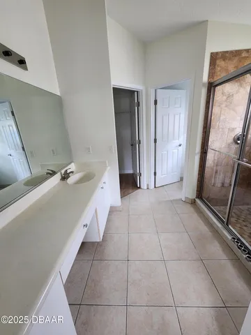 a bathroom with a bathtub and a sink
