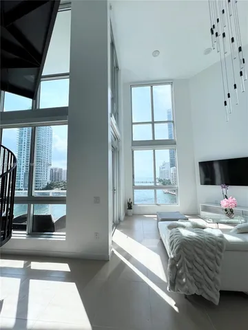 a kitchen with stainless steel appliances granite countertop a sink and stove top oven