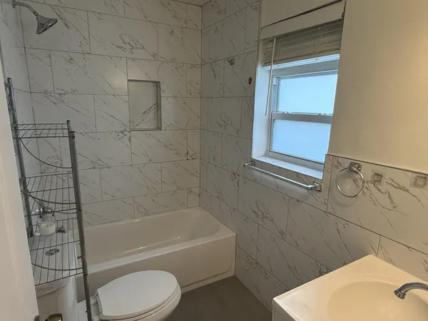 a house with palm tree in front of it