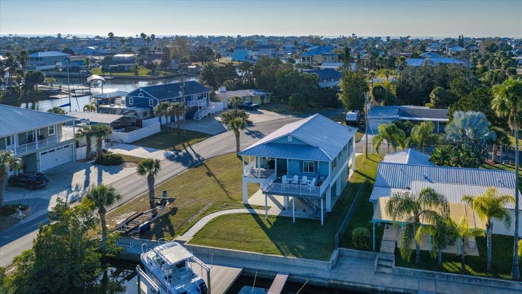 4452 Kingston Drive Hernando Beach, FL 34607 - Photo 2 of 47 an aerial view of a house with outdoor space