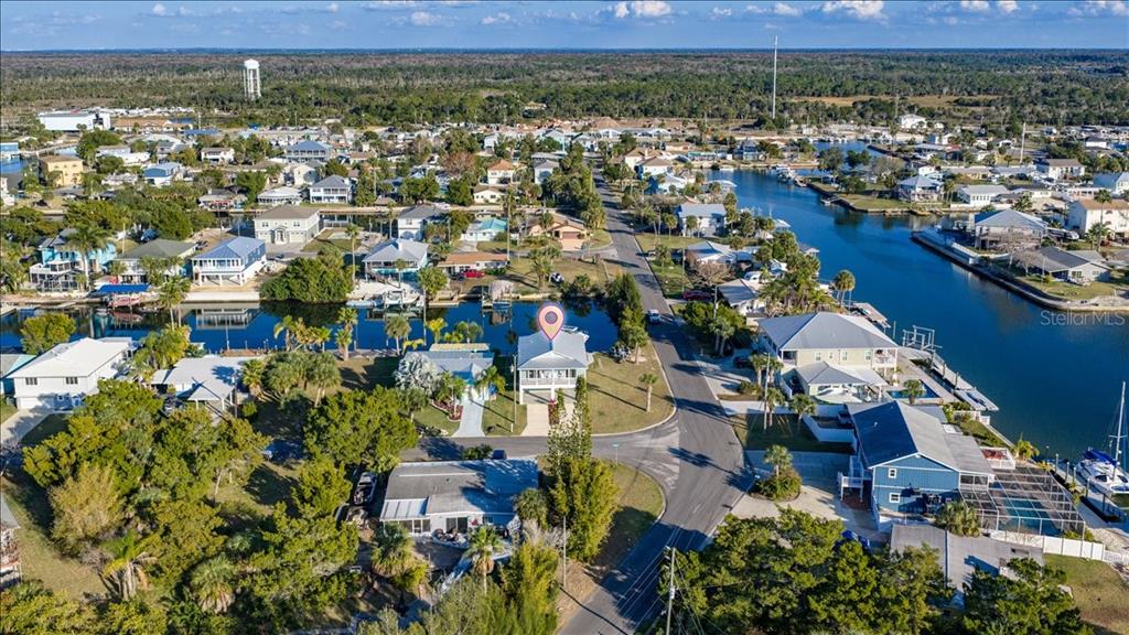 4452 Kingston Drive Hernando Beach, FL 34607 - Photo 41 of 47 an aerial view of residential houses with outdoor space