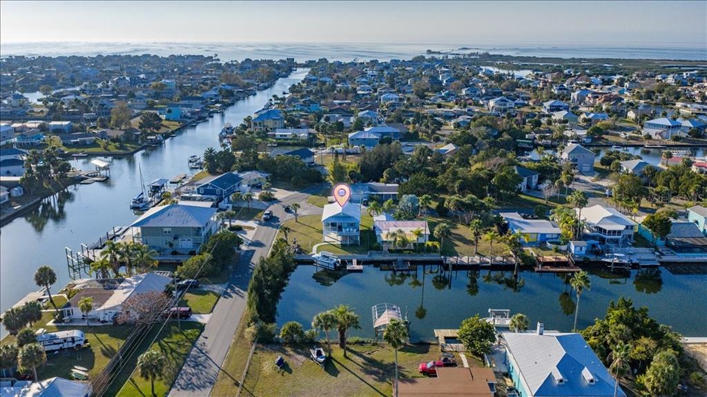 4452 Kingston Drive Hernando Beach, FL 34607 - Photo 44 of 47 an aerial view of a city