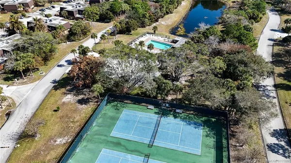 an aerial view of residential house with outdoor space