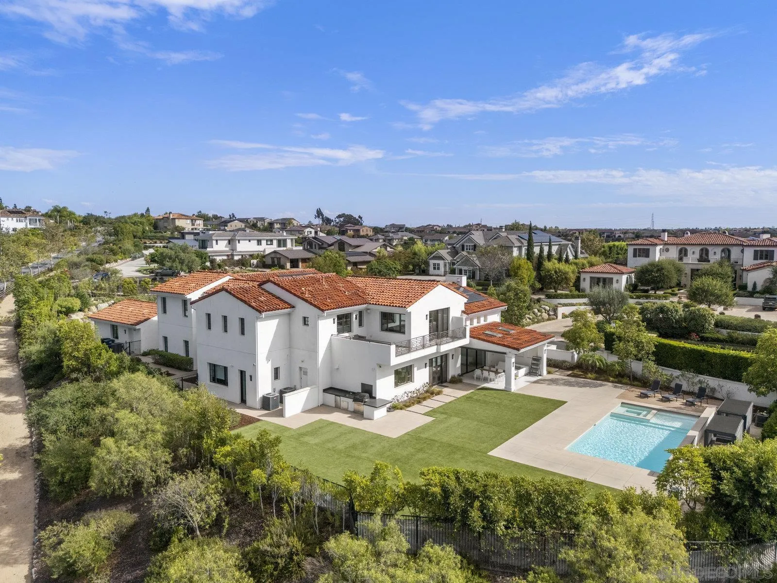 an aerial view of a house with a garden