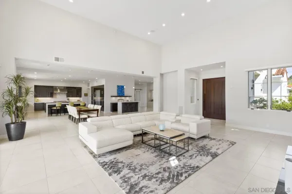 a living room with furniture and a rug