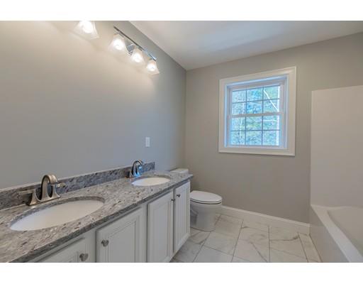 68 B Barrel Road Westminster, MA 01473 - Photo 17 of 26 a bathroom with a granite countertop sink a mirror and a toilet