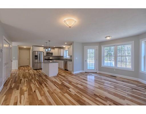 68 B Barrel Road Westminster, MA 01473 - Photo 9 of 26 a view of a living room a kitchen with wooden floor