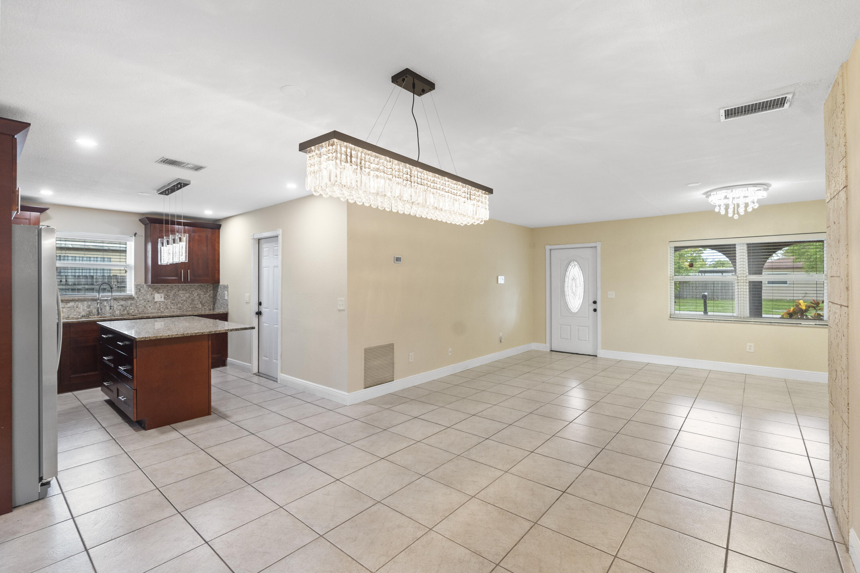 4784 Alfresco Street Boca Raton, FL 33428 - Photo 5 of 34 Dining Area/Kitchen