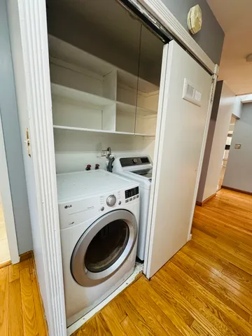 a view of bathroom with washer and dryer