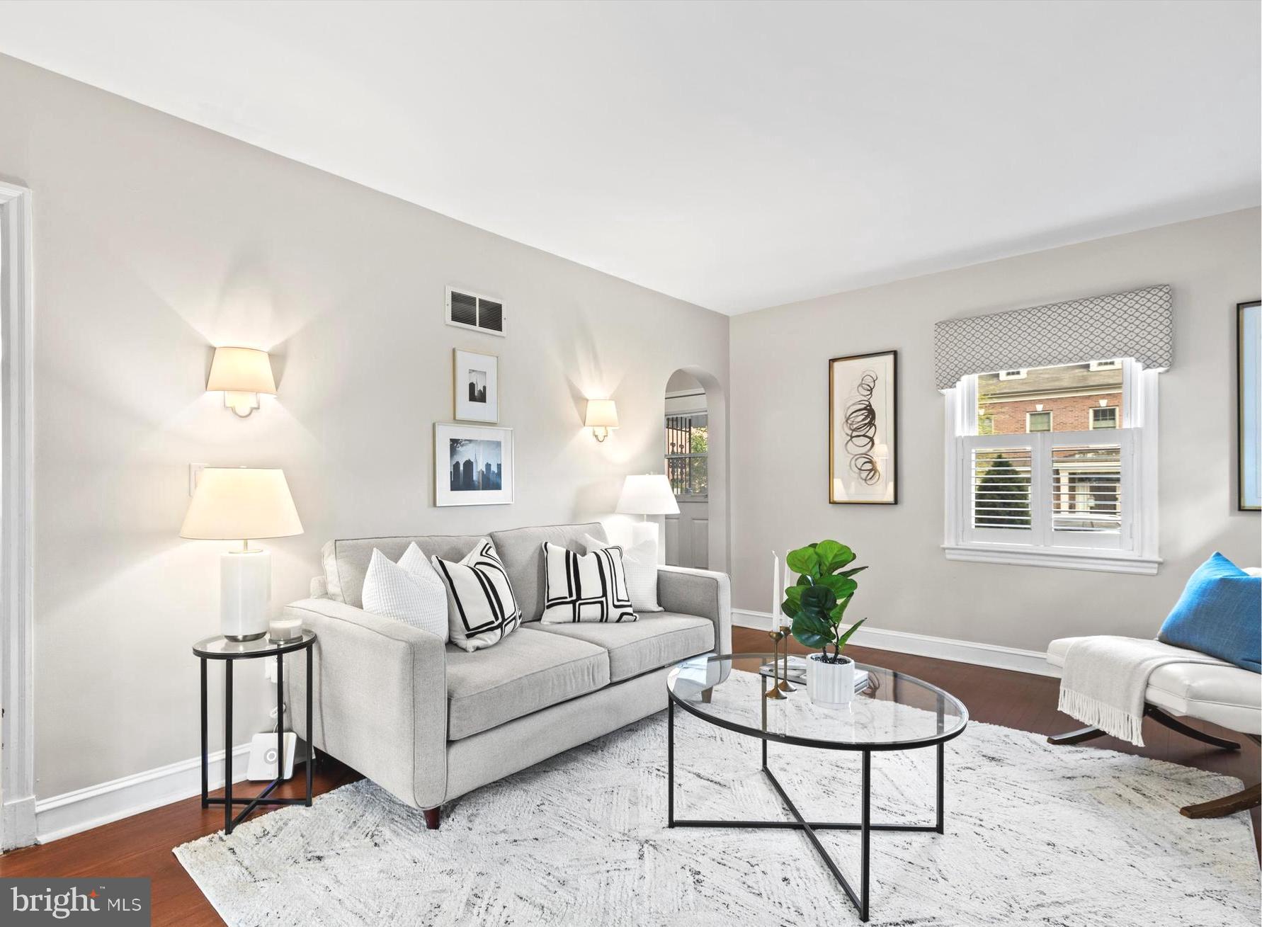 6118 Sligo Mill Road Northeast Washington, DC 20011 - Photo 2 of 28 a living room with furniture and a potted plant