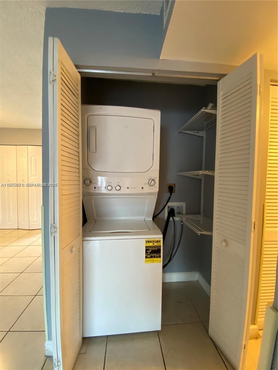 1735 West 60th Street, Unit M301 Hialeah, FL 33012 - Photo 12 of 29 a view of washer and dryer