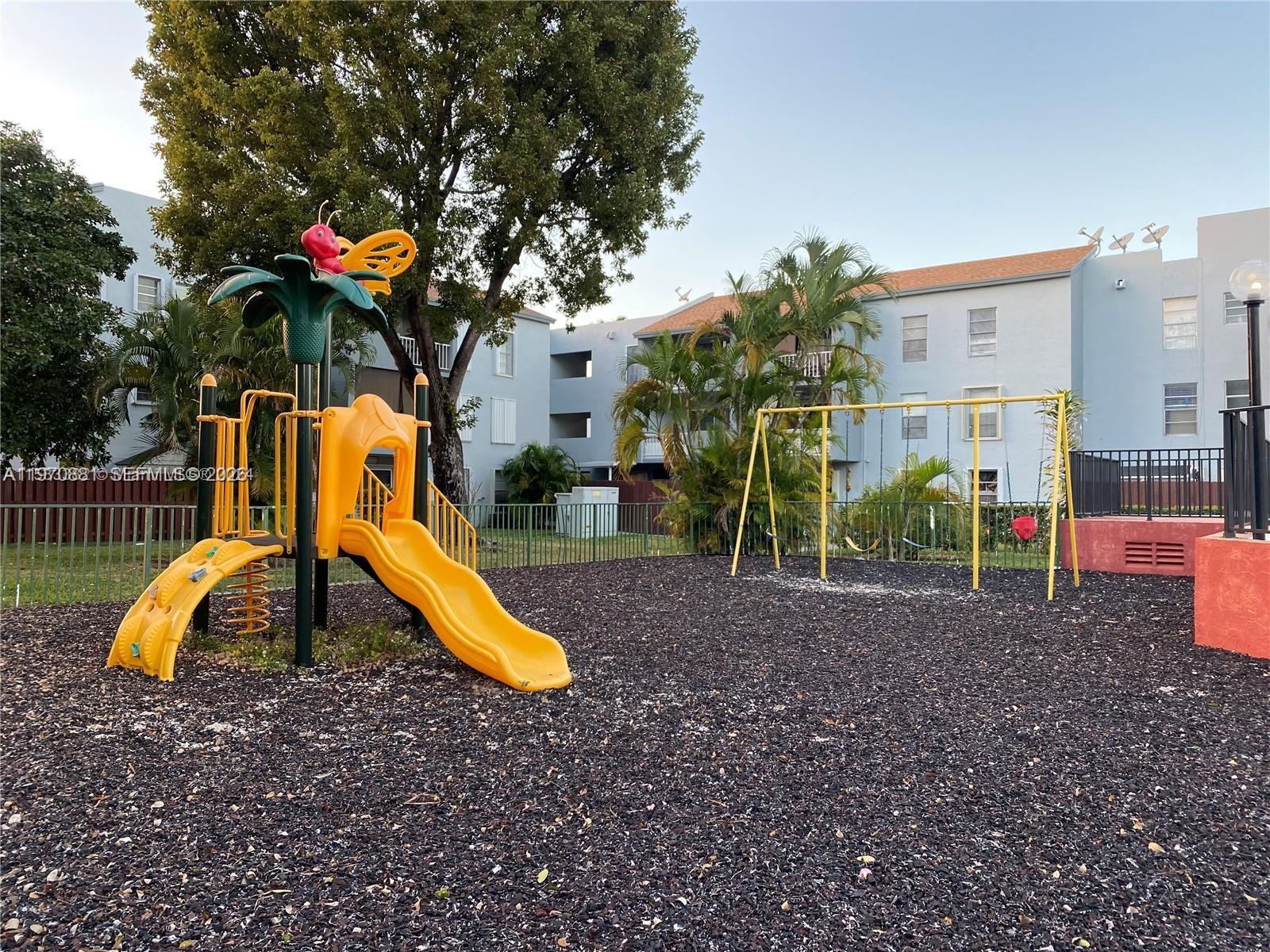 1735 West 60th Street, Unit M301 Hialeah, FL 33012 - Photo 27 of 29 a view of outdoor space with garden