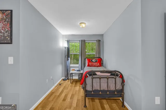 a room with a bed and a window